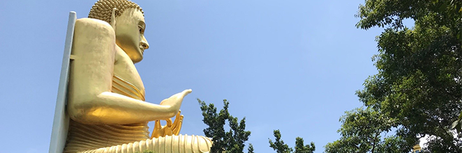 Side capture of the seated Buddha at Dambulla