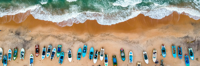 Aerial photo of boats on the beach